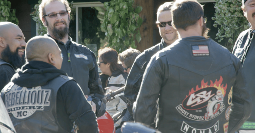 A group of motorcyclist gathered up for an event